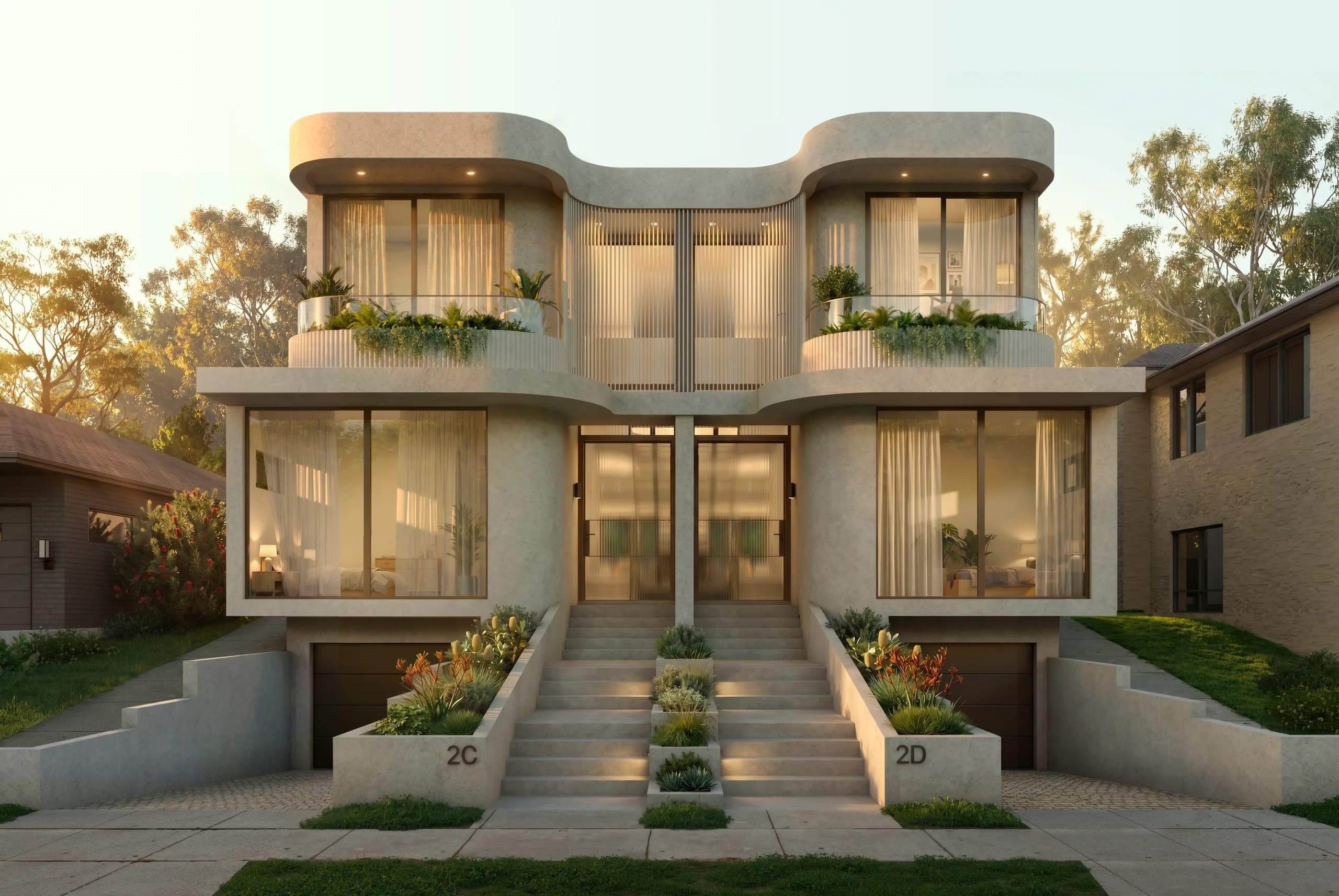 Street elevation of Ecru, curved limestone duplex residences in Bondi with rounded balconies and garden entry stairs