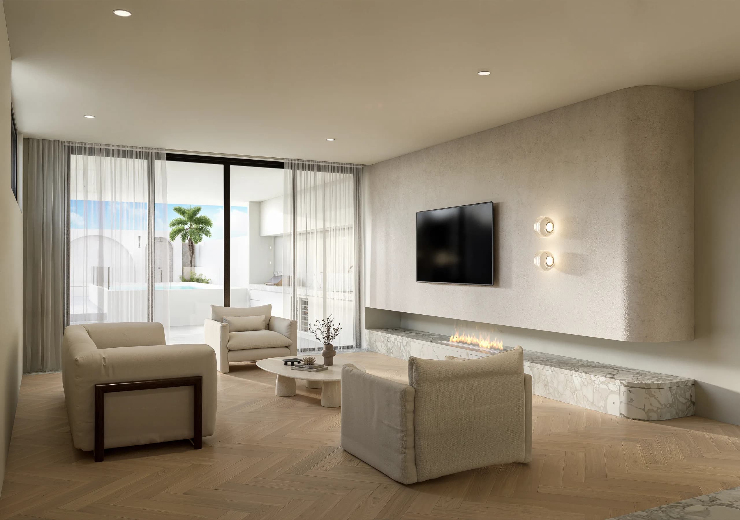 Living room at Ecru with travertine floors, curved plaster ceiling and sheer curtains filtering coastal light